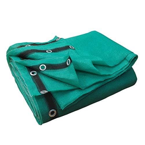 Folded green shade netting with reinforced black webbing and brass eyelets