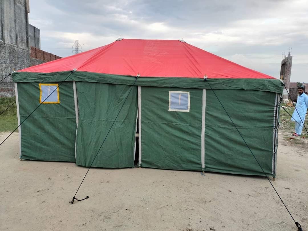 Military green and red heavy canvas field relief shelter tent fabricated in Karachi