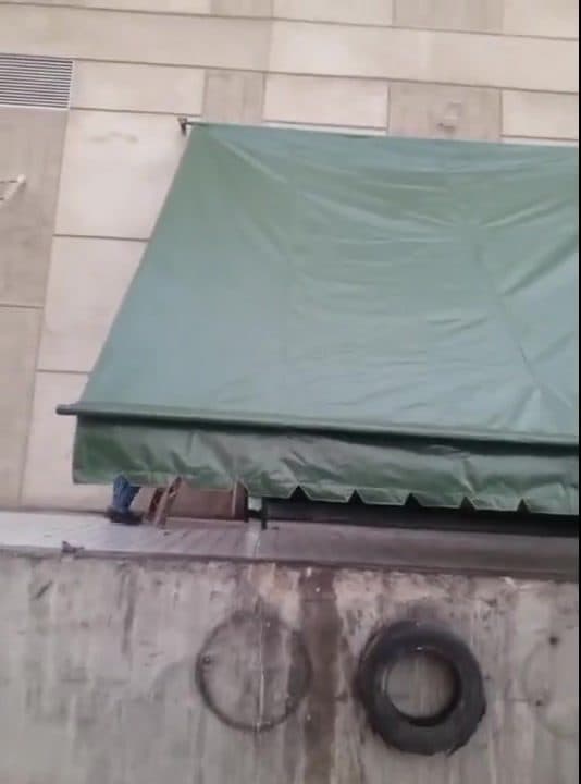 Waterproof tarpaulin canopy installation and rigging for loading dock and storage yard in Karachi